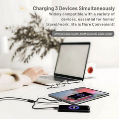 A desk setup showing the cable being used to charge two devices (laptop and phone) simultaneously.

